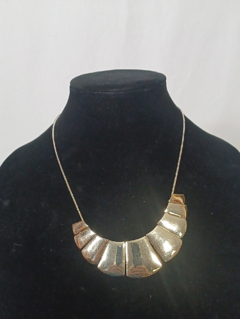 The Sak Gold Curved Segment Bib Necklace